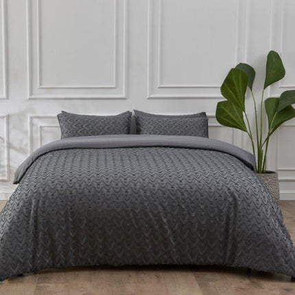 The AUDIE Duvet Cover Set is a luxurious addition to your bedroom. With its striking charcoal color, this set is perfect for any modern interior design. The luxurious polyestre blend fabric is soft to the touch and resistant to fade, perfect for creating a comfortable resting space.