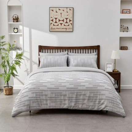 QUINCY Duvet Cover Set adds style and comfort to your bedroom with its classic grey color and luxurious feel. Crafted from 100% polyester, this set is machine washable and fade resistant for easy care. Enjoy a soft night's sleep all year round.