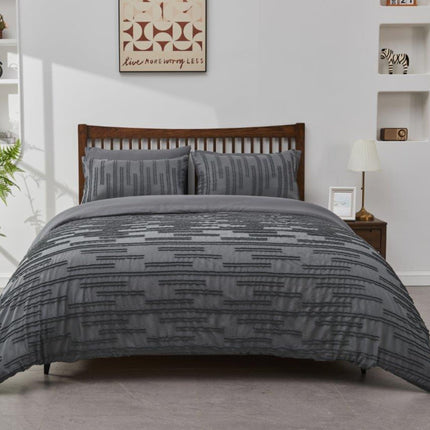 Quincy Duvet Cover Set is crafted from high quality material for a soft and lightweight feel. This charcoal colored set includes a duvet cover and matching pillow cases, and button closure for easy installation. Enjoy a cozy night's rest with this exquisite set.