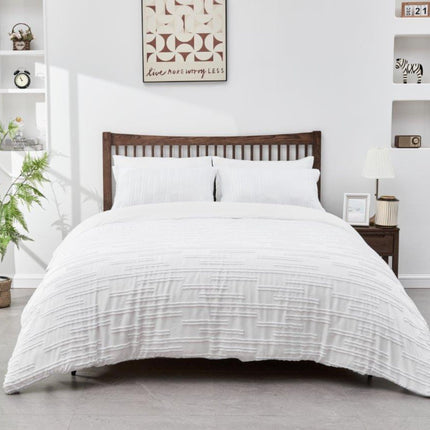 This QUINCY Duvet Cover Set is soft and luxurious, made with 100% polyester fabric that is breathable and comfortable. The white hue is stylish and timeless, perfect for any decor. Enjoy exquisite comfort and class with this set