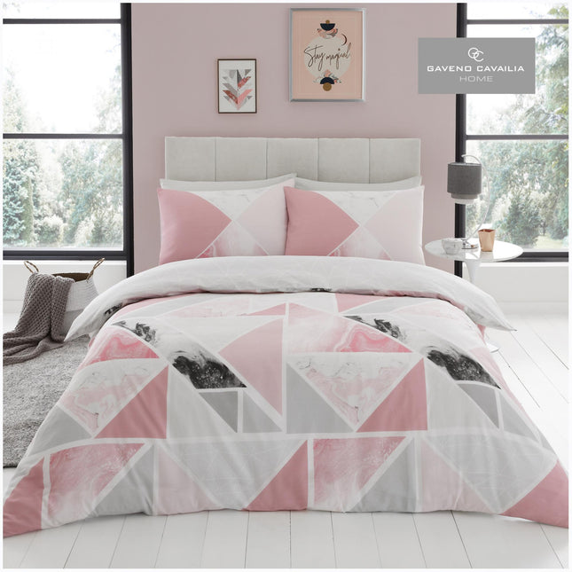 MILA Duvet Cover Set offers a classic design and a luxurious look. The pink color adds a soft and cozy touch to your bedroom. Expertly crafted from durable and soft material, this set is designed to provide you with enduring comfort and style.