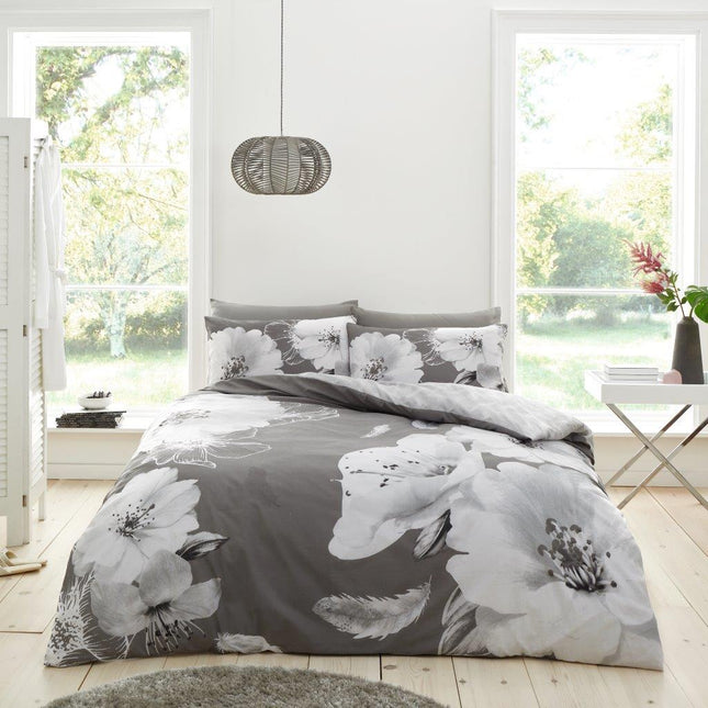 The AVA Grey Duvet Cover Set is designed with high-quality materials making it soft, breathable and lightweight. The set includes a duvet cover and two matching pillowcases, offering a modern and classic look to any bedroom. It's machine washable for easy cleaning.