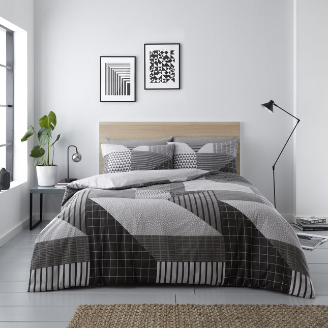 Elevate your sleep sanctuary with the BLAKE Duvet Cover Set. Featuring a contemporary grey color, this duvet set is crafted from the finest soft-to-touch 50% cotton and 50% polyester material, providing maximum comfort and breathability. Get ready for the best sleep of your life.