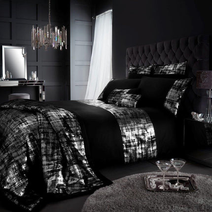 The PROSECCO Duvet Cover Set offers a luxurious look and feel to your bedroom decor. It features a beautiful black coloring and is crafted from high quality fabric for maximum comfort and durability. Its soft, breathable nature is perfect for providing an extra layer of warmth and relaxation.