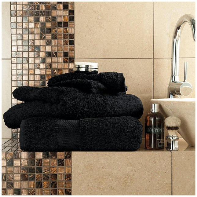 This MIAMI BATH SHEET towel is made from ultra-soft material, making it a luxurious and comfortable addition to your bathroom. The absorbent fabric also ensures quick and efficient drying, so you can stay warm and dry without a hassle. The sleek black color adds a touch of sophistication to any bathroom.