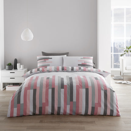 The BLOCKS Duvet Cover Set features a modern blush pink color, perfect for adding a touch of sophistication to your bedroom. Crafted from high-quality cotton blend, this duvet cover set is soft and lightweight, while also providing lasting durability. The set includes a duvet cover and Matching pillowcase shams to complete the look.