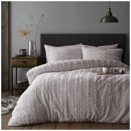 Indulge in the silky soft LUXE FAUX FUR Duvet Cover Set crafted from plush faux fur for a luxurious look and feel. Available in a beautiful blush pink color, this set is sure to add a touch of warmth and style to any room.