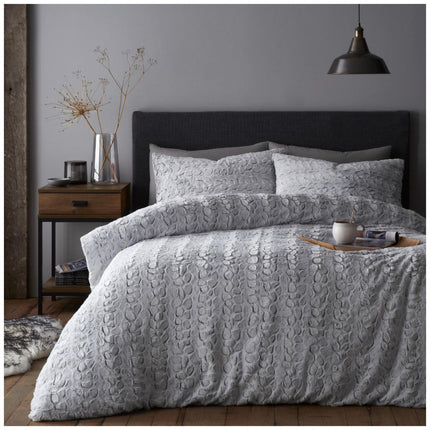 LUXE FAUX FUR Duvet Cover Set is crafted with the highest quality ultra soft faux fur for superior warmth and comfort. Crafted with a solid charcoal color, this duvet cover set is perfect for creating a cozy and inviting bedroom space. Enjoy the look and feel of luxury without the high price tag.