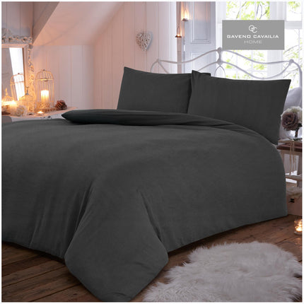 This FLANNEL PLAIN Duvet Cover Set is made from an ultra soft 100% brushed cotton for maximum comfort. The charcoal color adds a stylish touch to any room. The breathable fabric makes it perfect for year-round use. It's a great choice for a classic and timeless look.