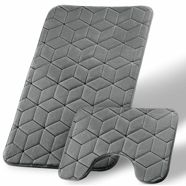 The CUBE BATH MAT is the perfect choice for keeping your bathroom floor dry. Its unique design includes water absorbent fibers and a memory foam construction that make it highly absorbent and anti-slip for optimal safety. Its charcoal color is sure to add elegance and style to any bathroom.