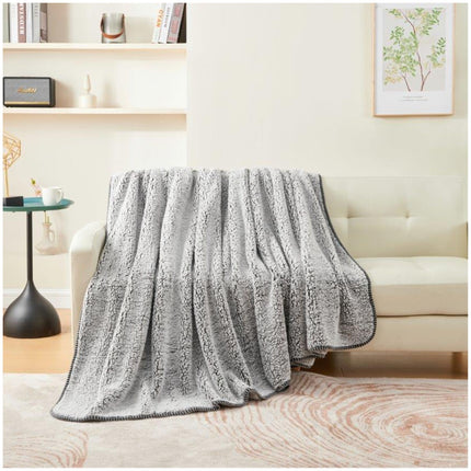 MELANGE is the perfect choice for those looking for a super soft and cosy blanket. Its hypoallergenic fabric makes it ideal for those with skin sensitivities, while its Charcoal Color is perfect for adding a calming touch to any room. Wrap yourself in warmth and comfort with this amazing blanket.