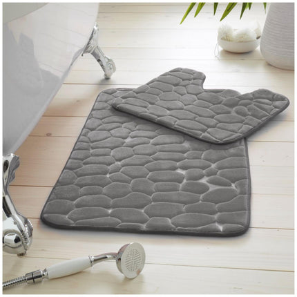 Our PEBBLE BATH MAT set is the perfect addition to your bathroom. It's made of ultra soft, water absorbent material with an anti slip, cube-like texture. The memory foam inner core provides the comfort of a spa-like experience. Available in charcoal.