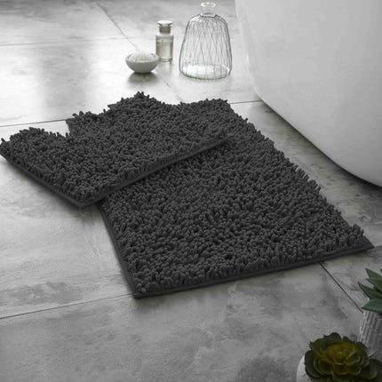 Made from an ultra-soft Memory Foam core, this LOOP BATH MAT SET offers superior comfort while standing in the shower. Thanks to its non-slip PVC back, the set is able to stay firmly in place for the duration of your shower. Water absorbent and machine washable at 30°C, the set is the perfect addition to make your bathroom safe and comfortable.