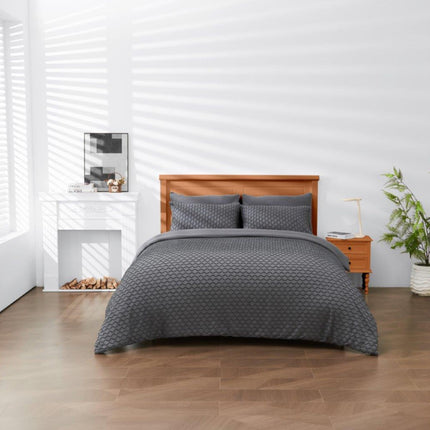 Introducing COOPER Duvet Cover Set, designed to provide comfort and style. The charcoal color adds a sophisticated touch to any bedroom setting. Crafted from soft touch materials, this duvet cover set is perfect for a cozy and peaceful sleep.