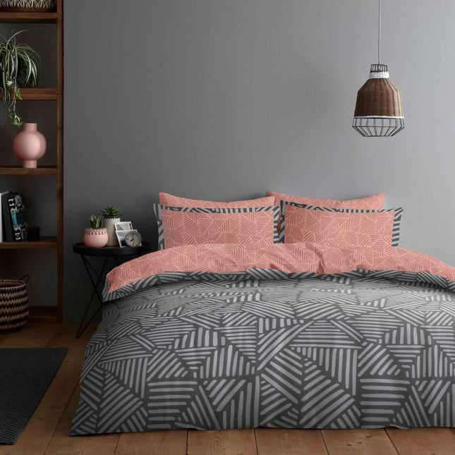 The CRUZ Duvet Cover Set is the perfect choice for a contemporary and sophisticated bedroom. Crafted from soft and breathable fabric, the duvet set includes a reversible blush pink and grey design that will instantly add a beautiful touch to your décor. Enjoy a luxuriously comfortable night’s sleep with this high quality duvet set.