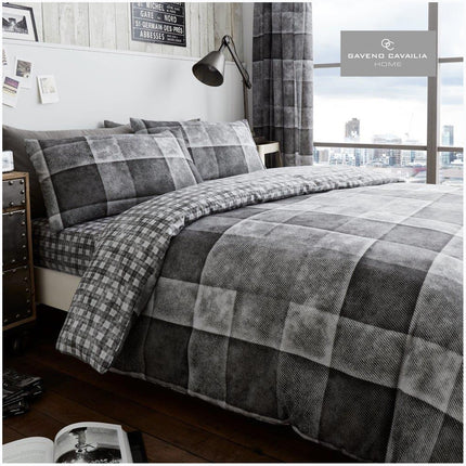 Introducing our DENIM CHECK Duvet Cover Set! This stylish set is crafted from durable, lightweight Cotton Blend fabric and features a classic grey check pattern. The breathable fabric ensures comfort and warmth, perfect for any bedroom.