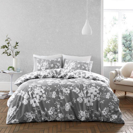 ELIZA FLORAL Duvet Cover Set is crafted from luxurious cotton blend for luxe softness. The timeless floral design on a grey background, combined with the high-quality fabric, offers a stylish and comfortable look perfect for any bedroom.