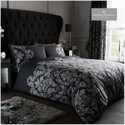 Elevate your bedroom decor with the luxurious EMPIRE DAMASK Duvet Cover Set. This black duvet cover set is crafted in high quality materials with a classic damask design, perfect for adding extra sophistication to your bedding. Enjoy a cozy, luxurious sleep with this stunning set.