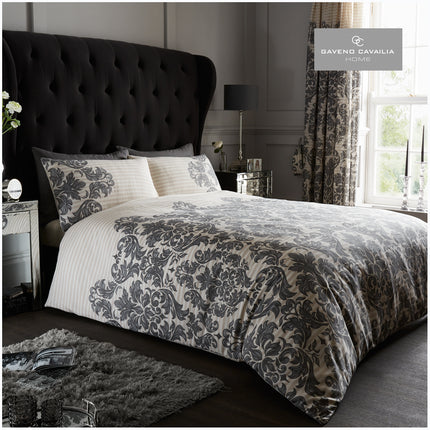 The elegant Empire Damask duvet cover set is crafted from soft and durable polyester and cotton with a sophisticated damask pattern. The cream color brings a refined touch to your bedroom décor. The set includes one duvet cover and two matching pillowcases.