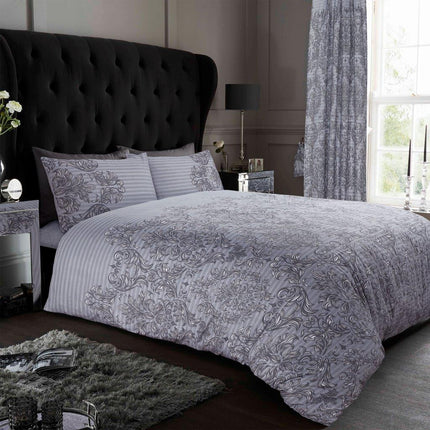 The EMPIRE DAMASK Duvet Cover Set in Grey features a classic damask pattern with an intricate floral scroll design defined by smooth lines. Made of high quality polyester and cotton, this duvet cover is breathable and durable, making it ideal for year round use.