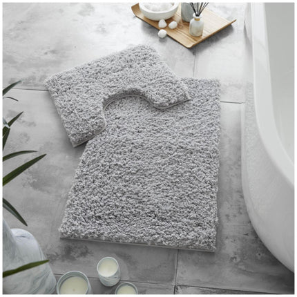 Discover true luxurious comfort with the ZERO TWIST Shaggy Bath Mat Set. This soft, shaggy set is crafted with ultra-fine microfibers for superior absorbency and a unique grey color to add style to any bathroom. Treat yourself to the perfect combination of comfort and style.