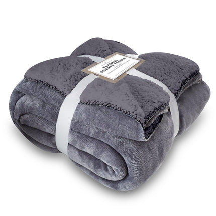 This FLANNEL SHERPA THROW AB is great for adding extra warmth and comfort to your home. It features a luxurious sherpa construction, providing a soft and cosy layer to your bed or couch. The grey colour is timeless, providing a decorative accent to your living space. Enjoy all the benefits of this throw, from movie nights to ultimate comfort.