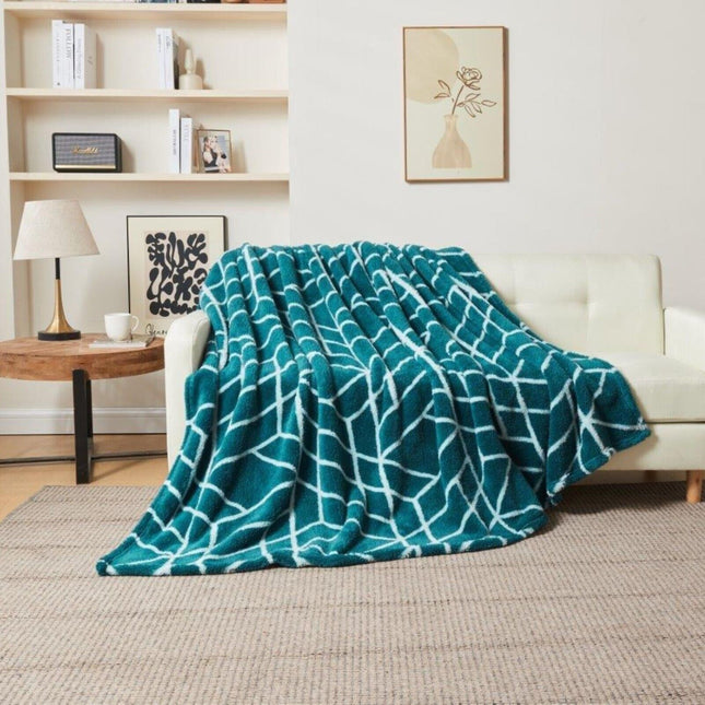 ELY GEO is a premium quality blanket crafted from charcoal fabric with degrees of softness. It is colorfast, hypoallergenic, and skin friendly, making it the perfect choice for ultimate comfort and warmth.