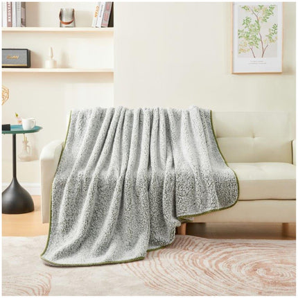 MELANGE is the perfect cozy companion for those cold winter nights. This super soft blanket is made with hypoallergenic fabric, ideal for those with skin sensitivities. Keep warm and toasty with this vibrant Green blanket.