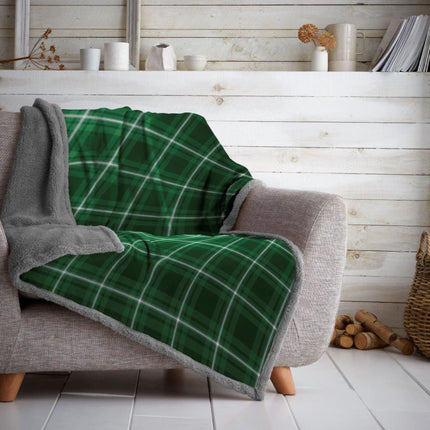 Stay warm and comfortable with the HIGHLAND CHECK Sherpa Blanket. Crafted in a double-layer construction, this blanket features a stylish combination of bold green and charcoal colors. Its thick and fluffy texture ensures maximum warmth on even the coldest nights. Add a contemporary touch to any bedroom with this blanket.