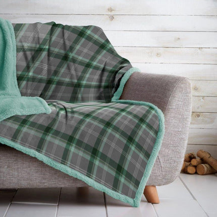 The LINCOLN CHECK AB blanket is constructed with durable, soft material, providing warmth and comfort through the coldest winter days. The intricate craftsmanship of the blanket is set off by a unique green/grey color combination, adding a sense of style to any home decor.