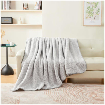 MELANGE is the perfect blanker for winter nights. Crafted with a super soft and cosy fabric, this hypoallergenic blanket will keep you snuggled in comfort all night. With its modern grey color, MELANGE is sure to be a stylish addition to any home.