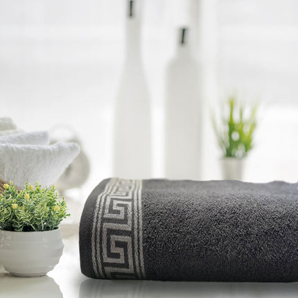 The EMB GREEK BATH SHEET is made from easy care fabric, making it both machine-washable and quick to dry. This bathroom linen item creates a luxurious feel in your bathroom, and its charcoal color adds an elegant touch to any home.