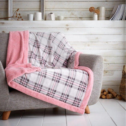 Experience contemporary class with this HIGHLAND CHECK Sherpa blanket. Crafted in a double-layer construction, the blanket offers a unique combination of bold grey and pink colors, perfect for adding a stylish finishing touch to any bedroom. Its thick and fluffy texture ensures warmth and comfort on the coldest of nights.