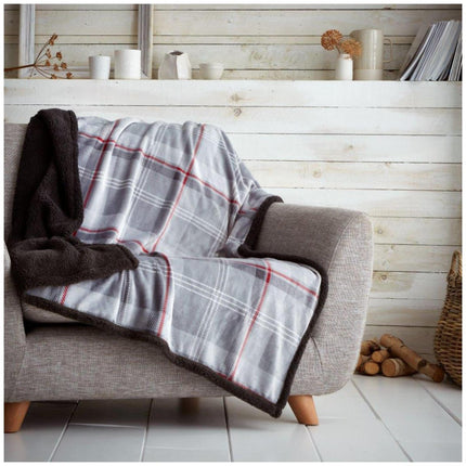 This LINCOLN CHECK blanket is made of a high-quality, warm material, sure to keep you cozy on the coldest of winter days. Crafted with great care, its striking grey and red color combination will provide visual appeal as well as comfort.