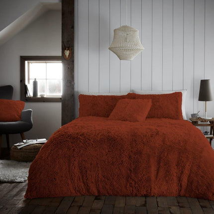 The HUGG & SNUG Teddy Duvet Cover Set is crafted from 100% soft and durable polyester for comfort. With its elegant rust color, it brings a modern touch to your bedroom décor. It's also machine washable for easy care.