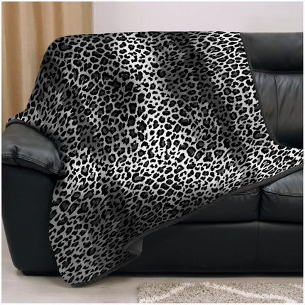 Stay warm without compromising your style and comfort with this faux fur throw blanket. Colorfast and Hypoallergenic, it's a perfect addition to your home. Animal Skin, Jungle Dark Grey Color.