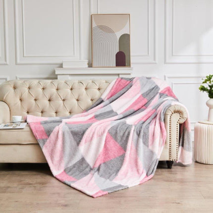 This luxurious and comfortable throw, available in Blush Pink/Grey, is the perfect blend of fashion and function. Made from breathable fabrics, it is ideal for adding a decorative touch and extra warmth to your bedroom, sofa or settee.