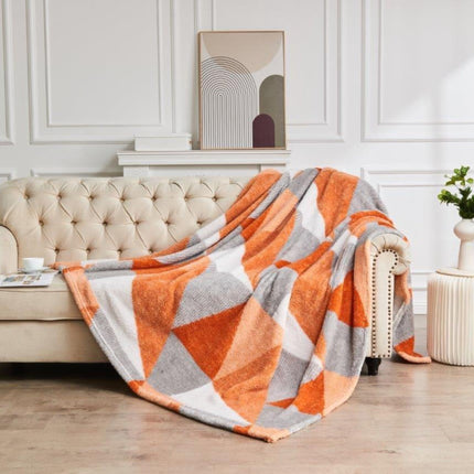 This breathable throw is luxuriously soft and comfortable, making it perfect for any home. Its versatile uses include bedspreads, sofa blankets, or settee throws. It is available in a classic rust/grey color that will look great in any setting.