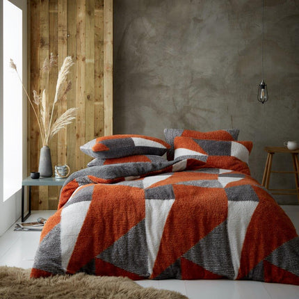 The LICHFIELD Duvet Cover Set is a luxurious and stylish addition to any bedroom. Crafted from luxurious polyester, this cozy set features a rust and charcoal color palette and is easy to care for. Create the perfect ambiance in any space with the warmth and comfort of this bedding set.