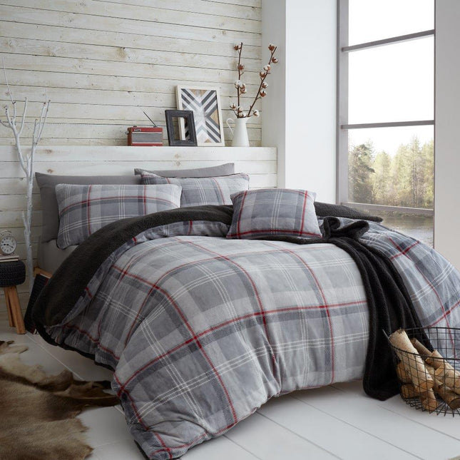 Experience ultimate comfort and luxury every night with the LINCOLN CHECK Teddy Duvet Cover Set. Crafted with high quality Polyester, this set is designed to ensure maximum breathability and durability. Its grey &amp; red color will add a stylish and luxurious touch to any bedroom. Perfect for every season, LINCOLN CHECK guarantees maximum satisfaction &amp; relaxation!