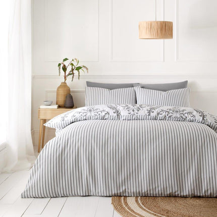 Expertly crafted for comfort and style, MARGAUX is a hypoallergenic duvet set that boasts a reversible side with a breathable stripe pattern. The modern charcoal color adds an elegant touch to any bedroom, making this pillow both practical and aesthetically pleasing.