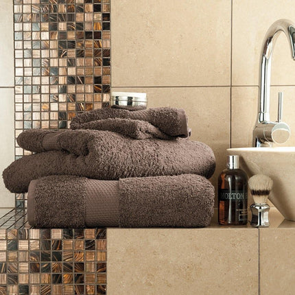 MIAMI Jumbo Bath Sheet is a luxurious, ultra-absorbent bath sheet that is crafted from 100% cotton for maximum comfort and softness. The camel color gives a sophisticated look to any bathroom. Perfect for wrapping after a shower or spa like pampering.