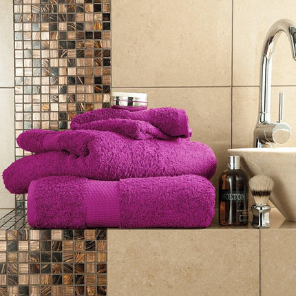 Introducing MIAMI, a luxurious bath towel crafted from plush cotton material. This sumptuous, magenta colored towel brings an eye-catching touch to any bathroom decor. Its superior absorbency and durability make it the ideal choice for pampering relaxation.