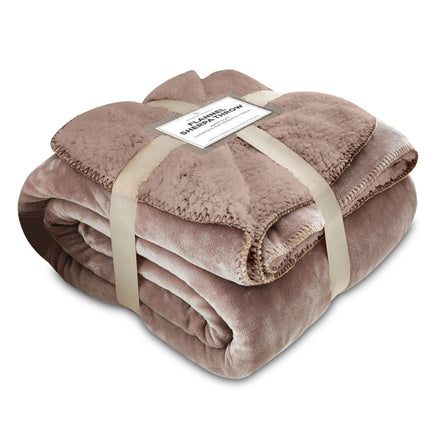 This FLANNEL SHERPA THROW AB offers superior comfort and warmth. The soft, luxurious texture is cozy yet lightweight, making it an ideal choice for any season. The mink color adds a touch of elegance and sophistication to your home. Experience the perfect balance of comfort and style.