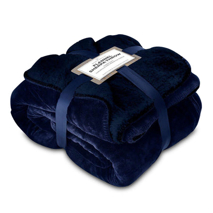 This Flannel Sherpa Throw is perfect for any living space. It is made of a luxuriously-soft Sherpa and cotton blend for maximum coziness, and features a navy colour to add a classic touch. It can also serve multiple purposes, such as a bed covering, a couch accent, or a comforting companion. Enjoy supreme warmth and comfort!