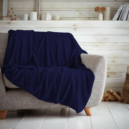 The POP CORN THROW gives you the comfort of a soft touch and luxurious feel due to its super-soft fabric with hypoallergenic properties. With its navy color, this sofa throw is both durable and colorfast, making it perfect for any living space. Plus, it is machine washable at 30°C, making it easy to maintain. Enjoy the comfort and convenience of a traveling throw wherever you go.