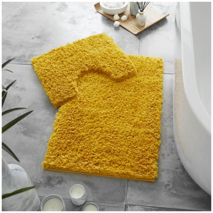 This ZERO TWIST shaggy bath mat set is must-have for your bathroom. The high-pile, 100% polyester material makes it incredibly soft and comfortable, while the Ochre color adds a subtle touch of style. Machine washable and durable, this set will provide perfect comfort for years to come.