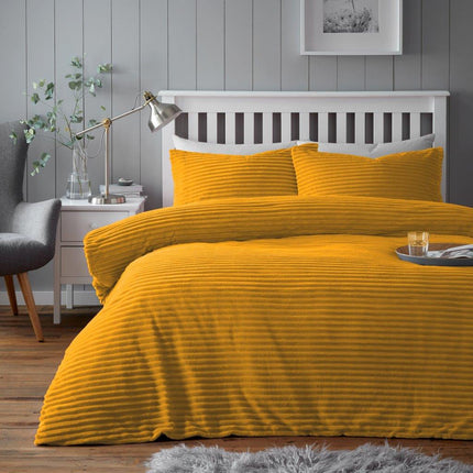 CHUNKY RIB teddy duvet cover set offers a cozy and comfortable look in your bedroom. It is available in an ochre color, and is crafted from high quality polyester for maximum durability. This set is sure to bring a touch of warmth and style to your space.