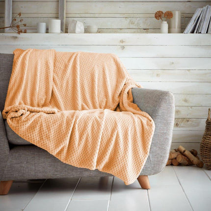 POP CORN THROW is made with ultra-soft material, perfect for draping over a sofa or for taking on the road. It is washable up to 30°C, colorfast and hypoallergenic for added comfort. Enjoy this cozy peach-colored throw for traveling or at home.