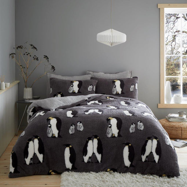 Emperor Penguin Duvet Cover Set offers contemporary style and natural beauty. Made with soft polyester, this set is ultra cozy, and the vibrant grey/silver colors add a touch of sophistication to any bedroom. The set includes one duvet cover and pillowcase.